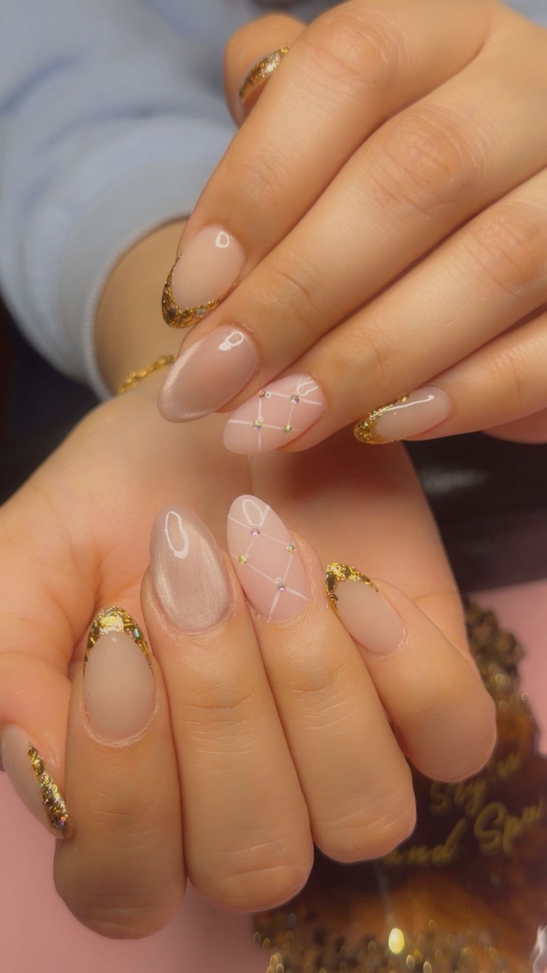 Nude gel with gold French tips